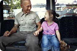 man and child on bus
